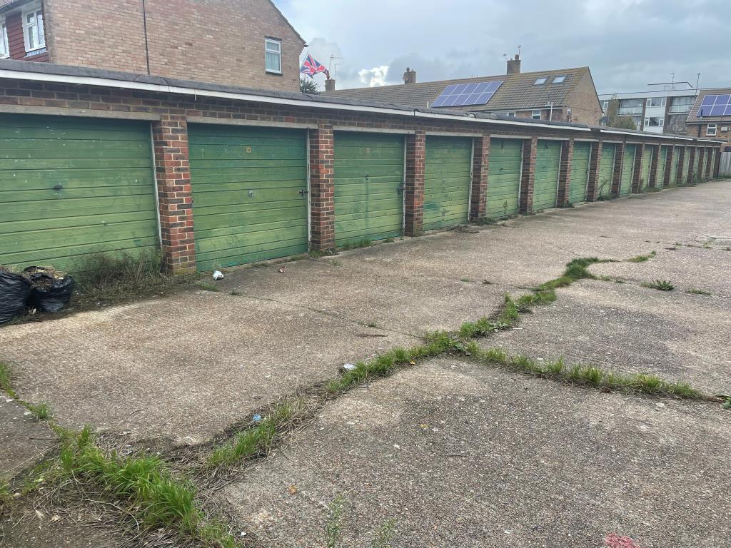 Lot: 123 - SIXTEEN GARAGES IN A COMPOUND - View of garages from southern end